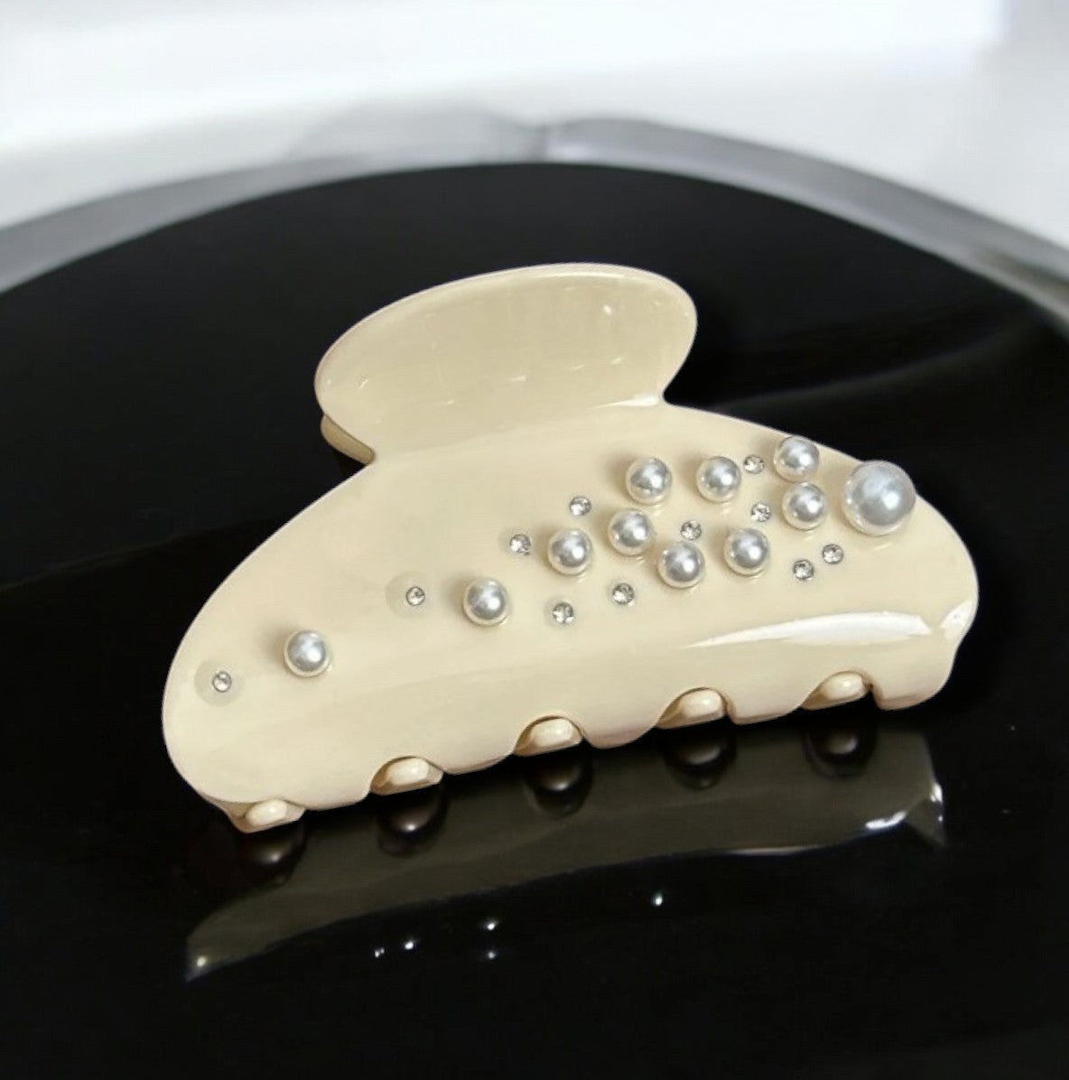 Elegant hair clip adorned with faux pearls