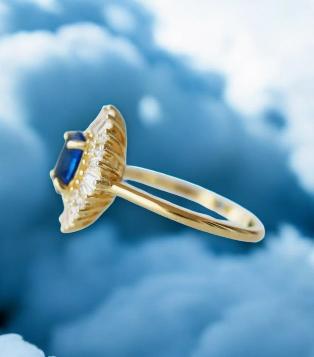 Close-up of a beautiful blue gemstone ring.