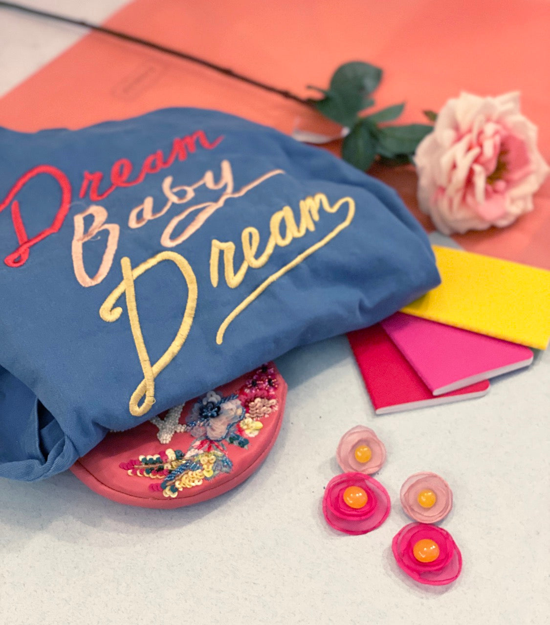 Adrenaline Blush Earrings with chiffon petals and yellow bead pistils.