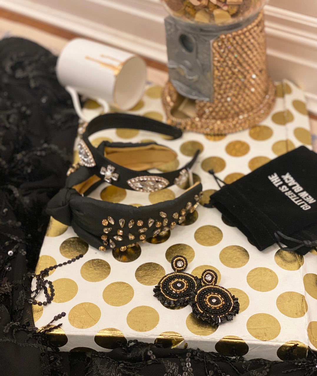 Stylish and elegant Andromeda Noir Earrings with cosmic design elements.