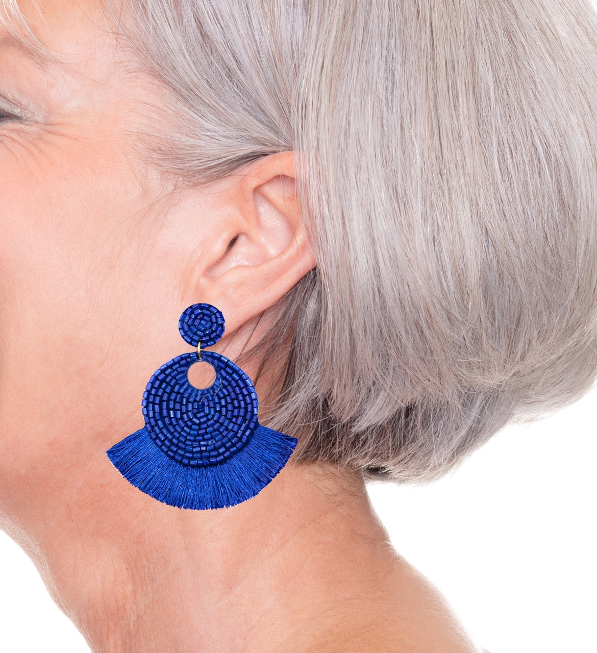 Artistic blue fringe earrings, lightweight and handmade, perfect for making a statement.