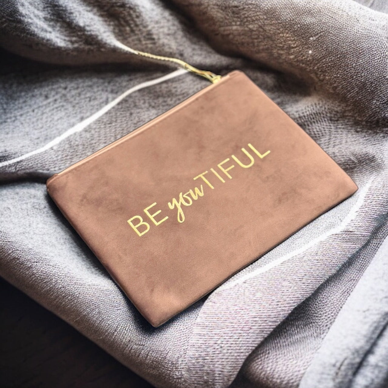 Complete your look with this fashion-forward, versatile pouch perfect for everyday use.