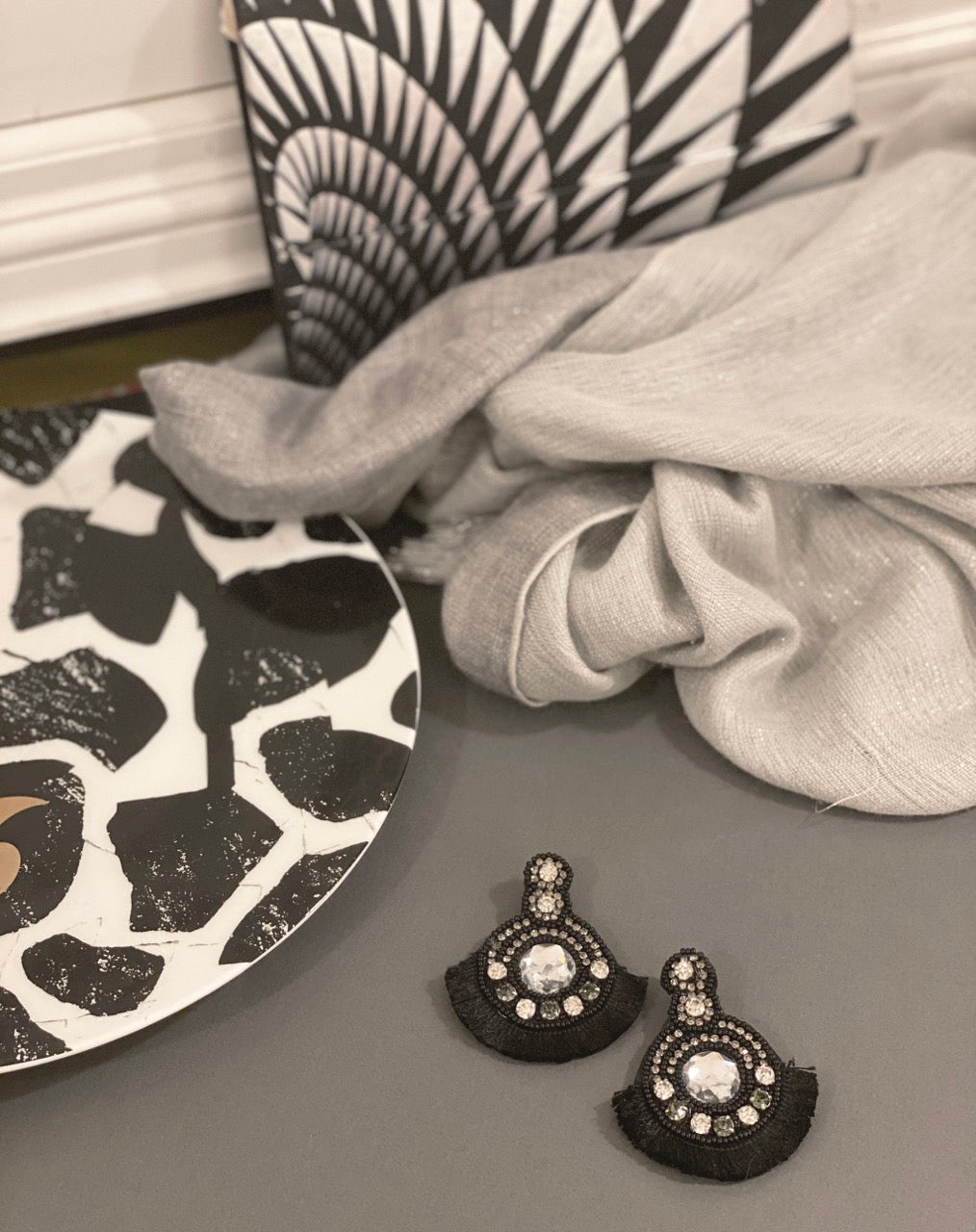 Versatile Space Oddity Onyx Earrings with a classic black design and unique patch, ideal for elevating any outfit.