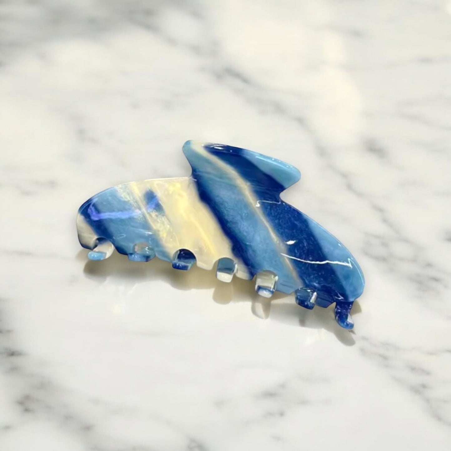 Chic marble effect blue swirl hair clip for elegant hair styling, suitable for thick hair.