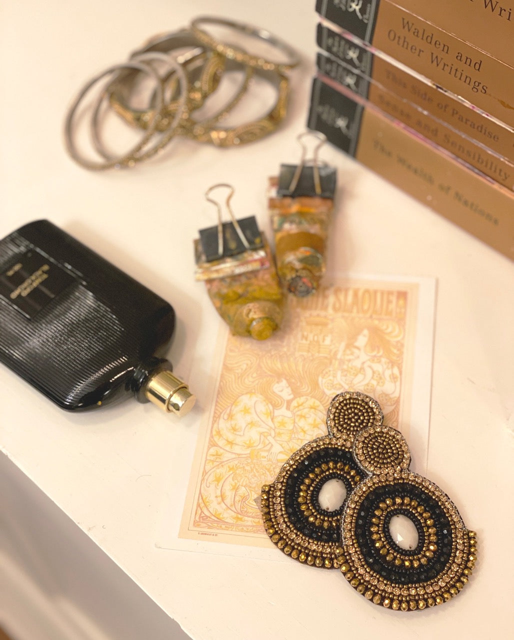 Lightweight black and gold boho earrings with hypoallergenic materials and hand-crafted design.