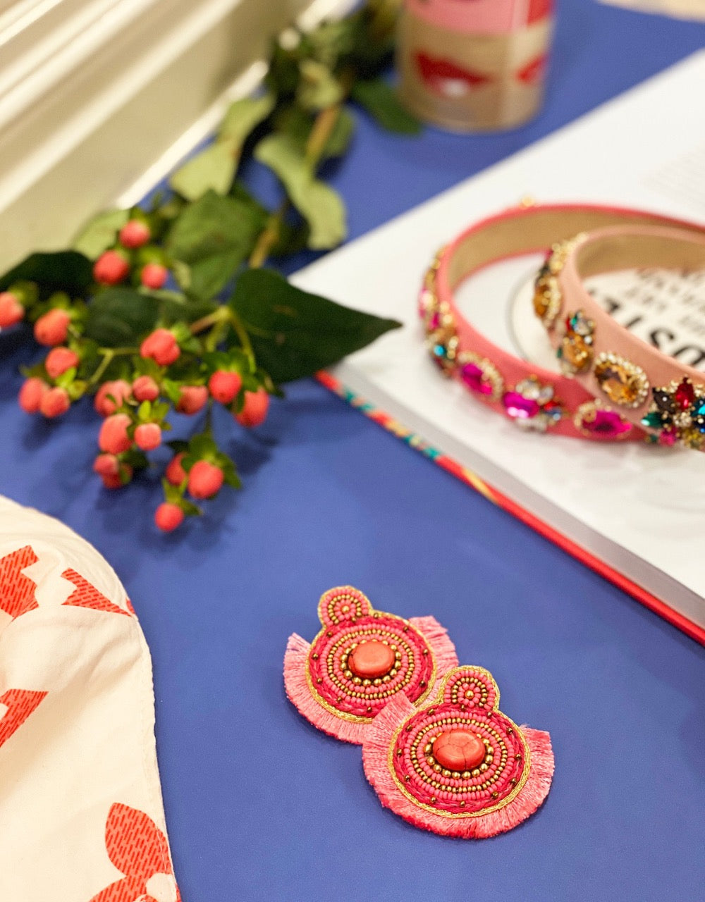 Fashion earrings with pink beads and boho flair.