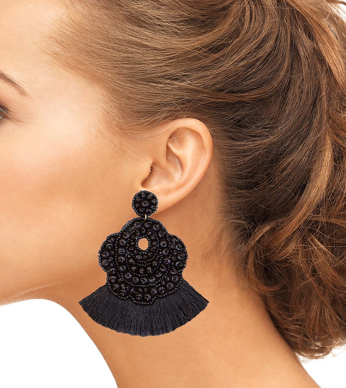Statement black earrings with a playful design featuring "Mercury Was In Retrograde" patches.