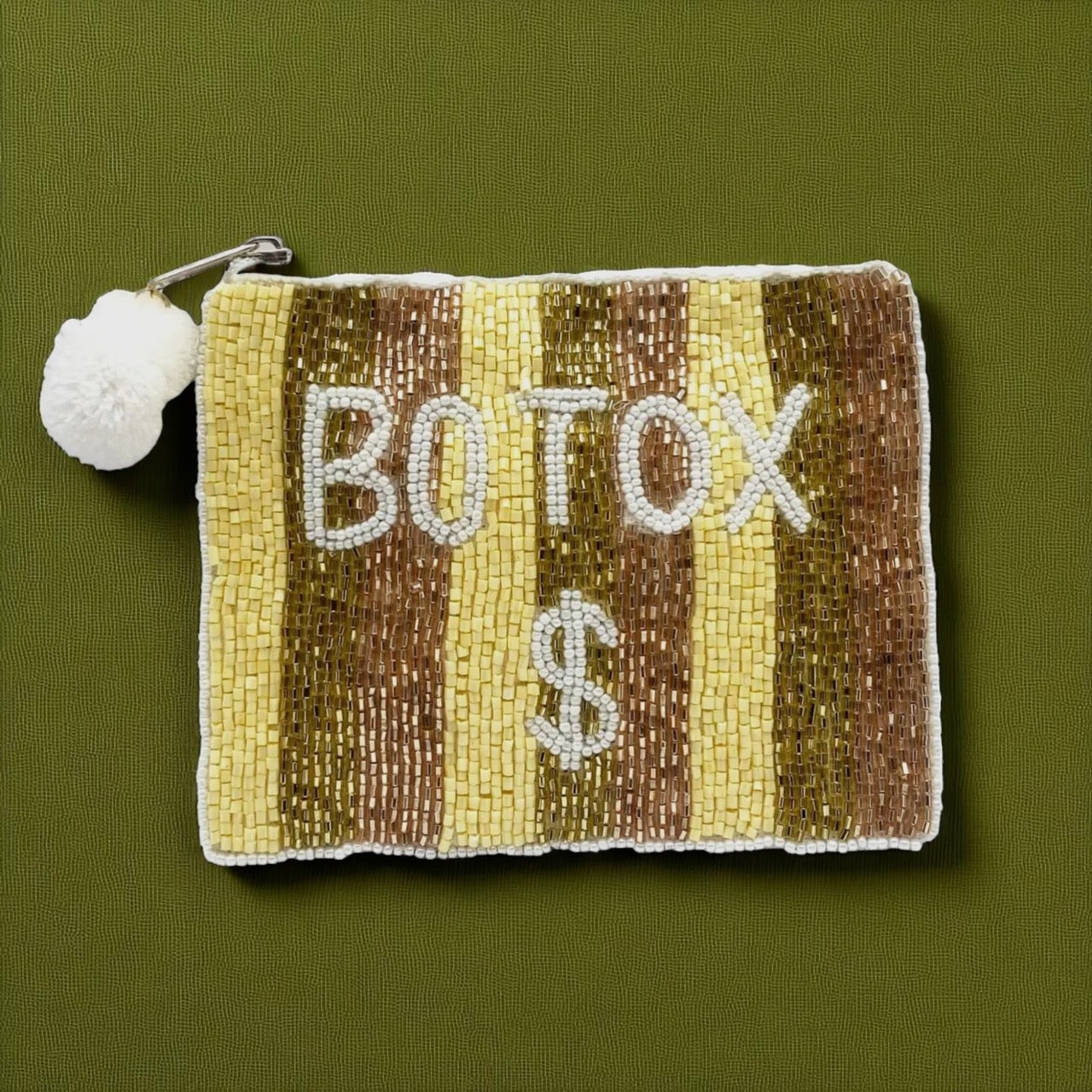 Beaded clutch pouch with yellow and brown stripes.