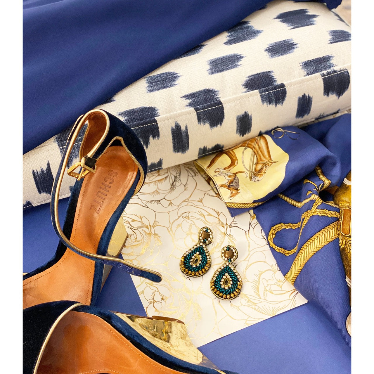 Handmade hypoallergenic turquoise earrings with intricate beaded teardrop design and unique detail.