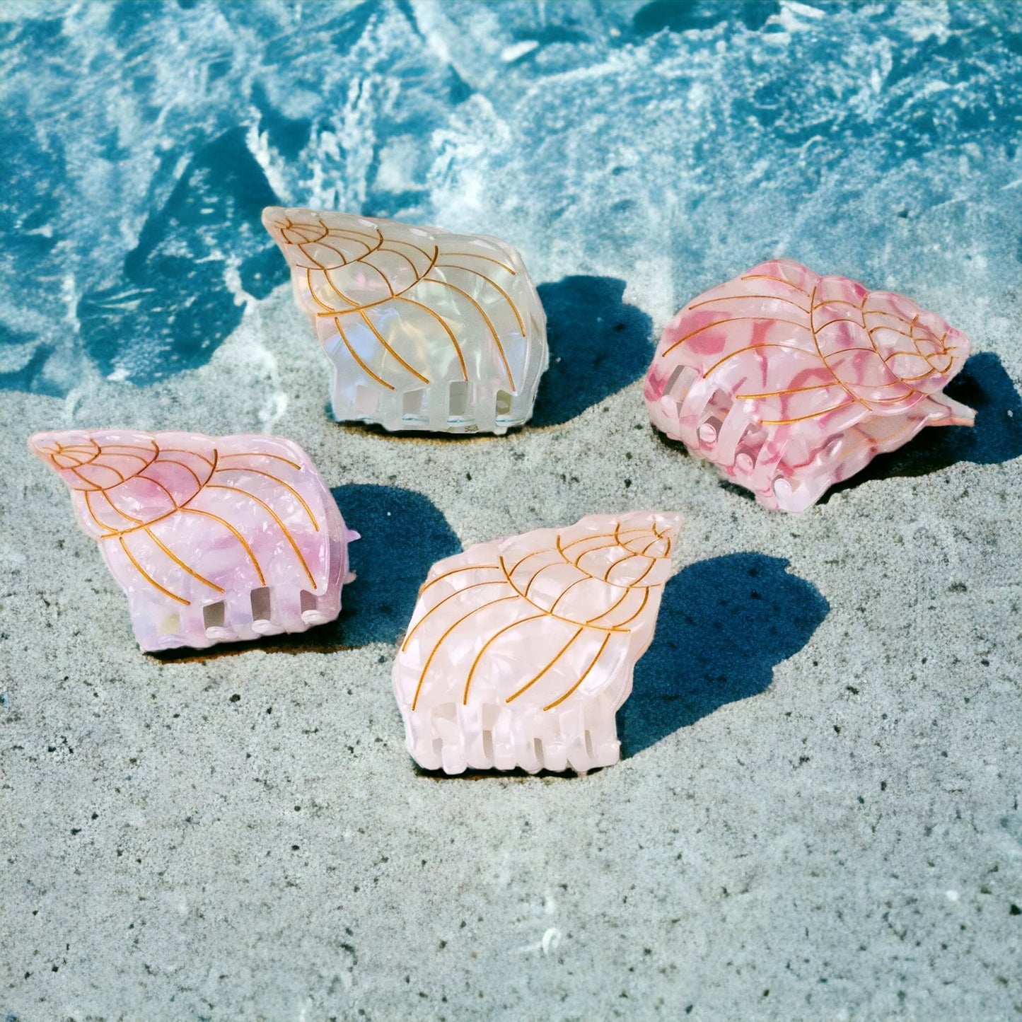 Playful lavender conch shell hair clips designed for stylish women and girls who love summer-inspired fashion.