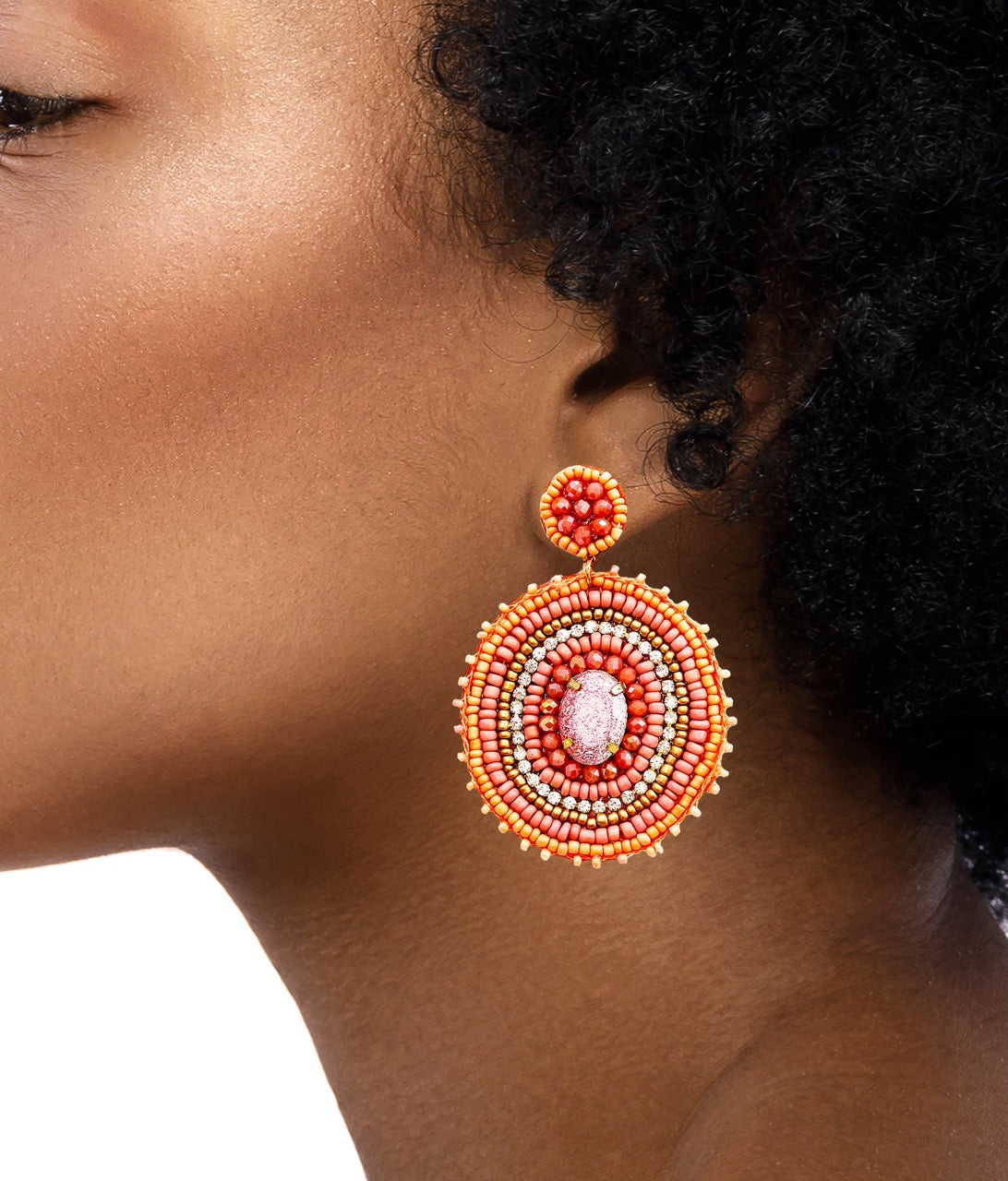 Lightweight coral earrings with hypoallergenic materials and hand-crafted design.