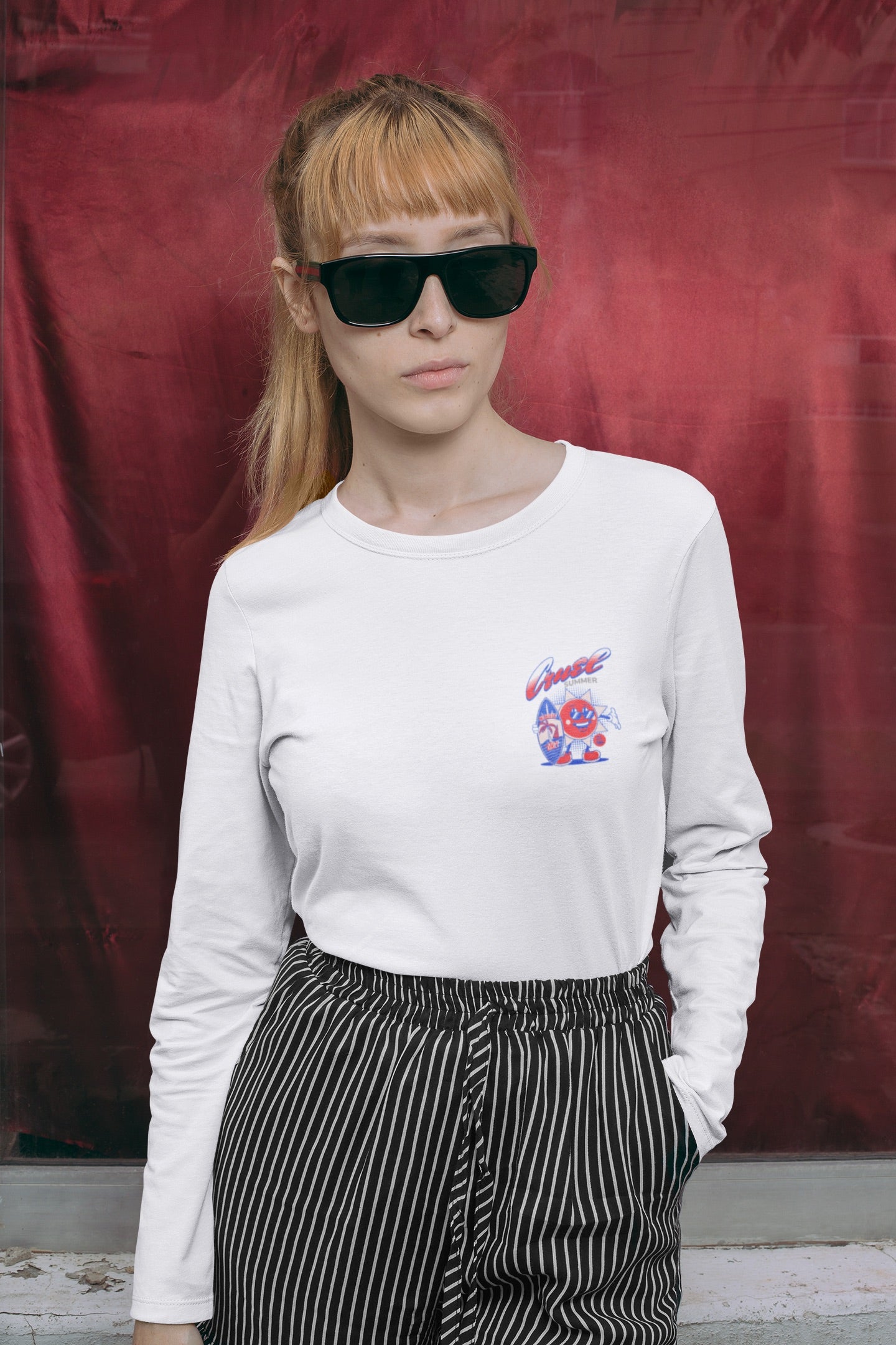 White long sleeve Swiftie tee with bold "Cruel Summer" themed text on the back and a subtle front design.