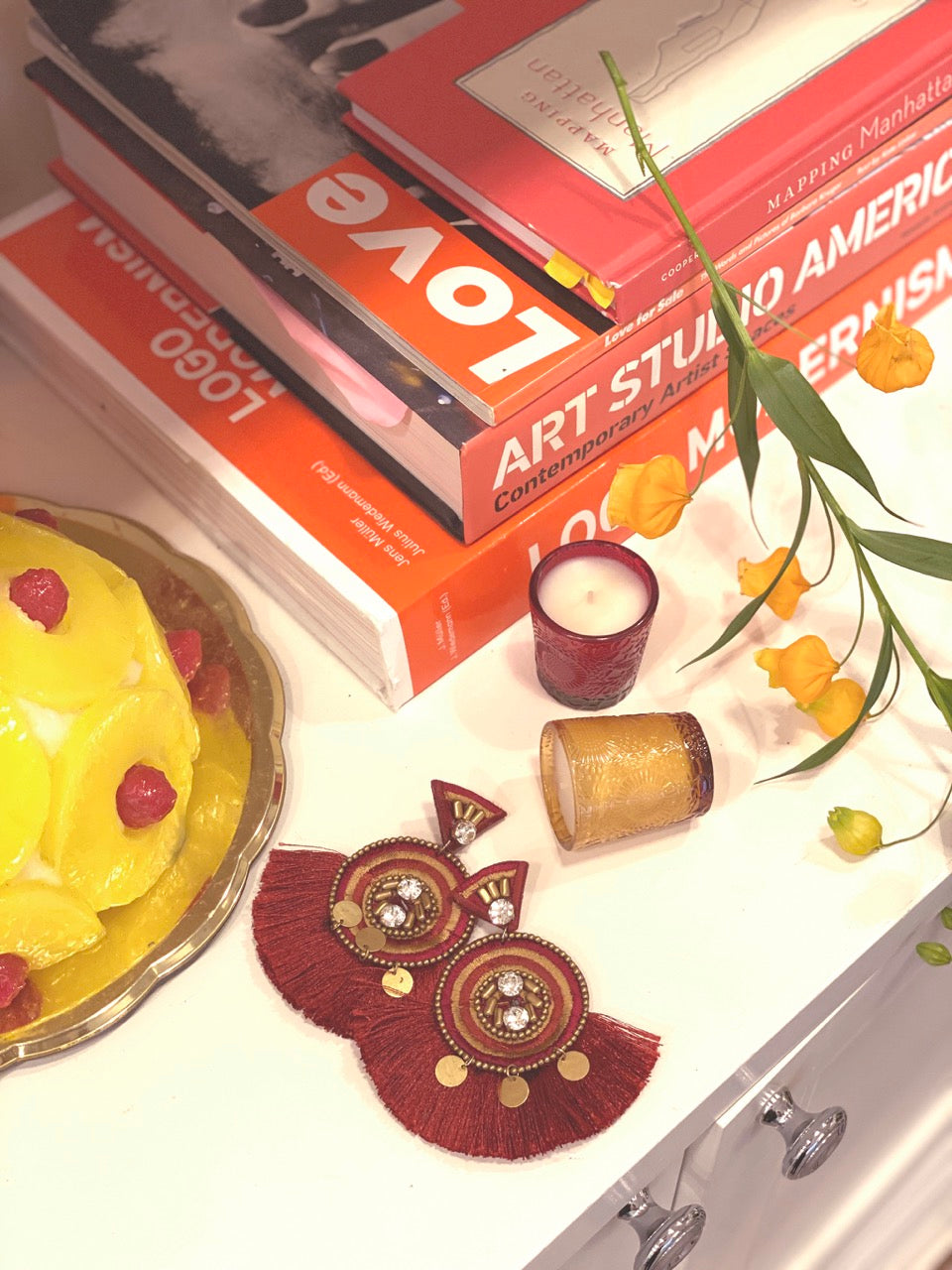 Handmade hypoallergenic red earrings with Aztec design and unique detail.