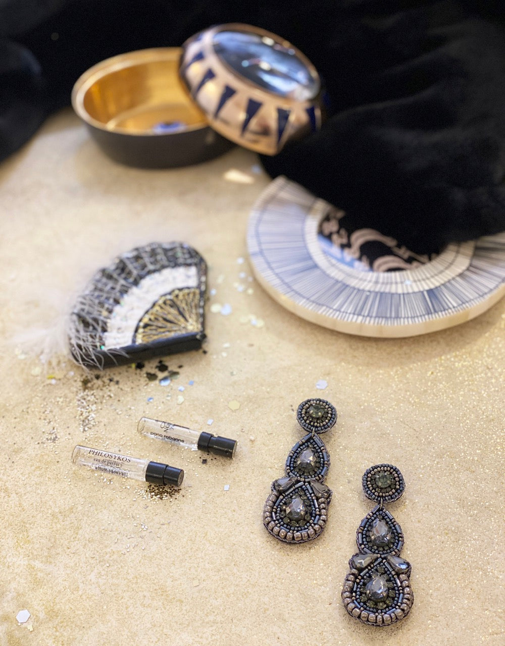 Handcrafted hypoallergenic midnight earrings with unique elephant patch detail.