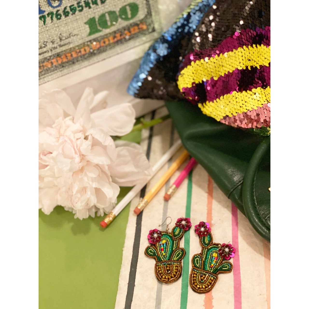 Handcrafted hypoallergenic cactus earrings perfect for casual and formal occasions.