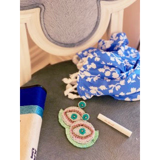 Artistic evil eye earrings with hypoallergenic materials and unique patch design.