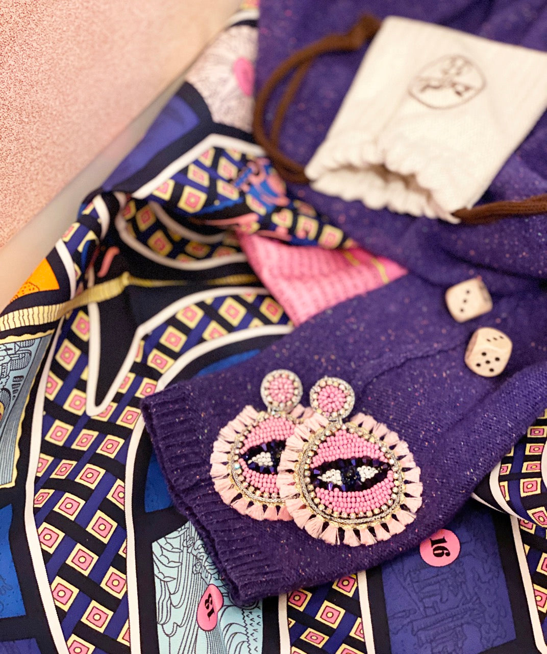 Fashion earrings with colorful boho style and mystical charm.