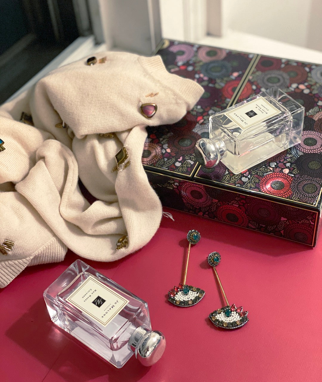 Fashionable and unique Eye Drop Earrings with bold beaded design and "Oh Shit" patch.