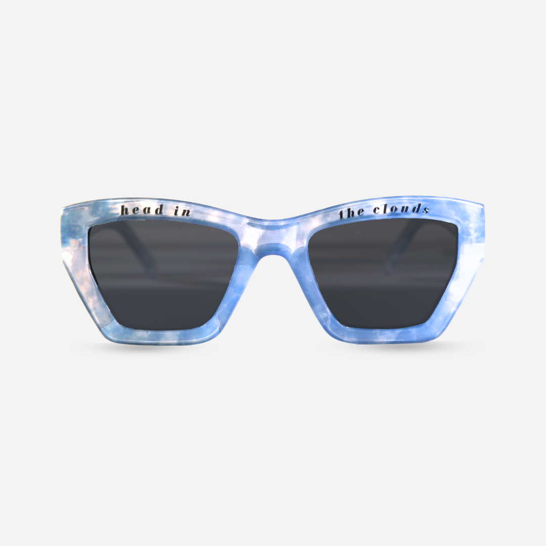 Oversized blue hexagonal sunglasses on a white background
