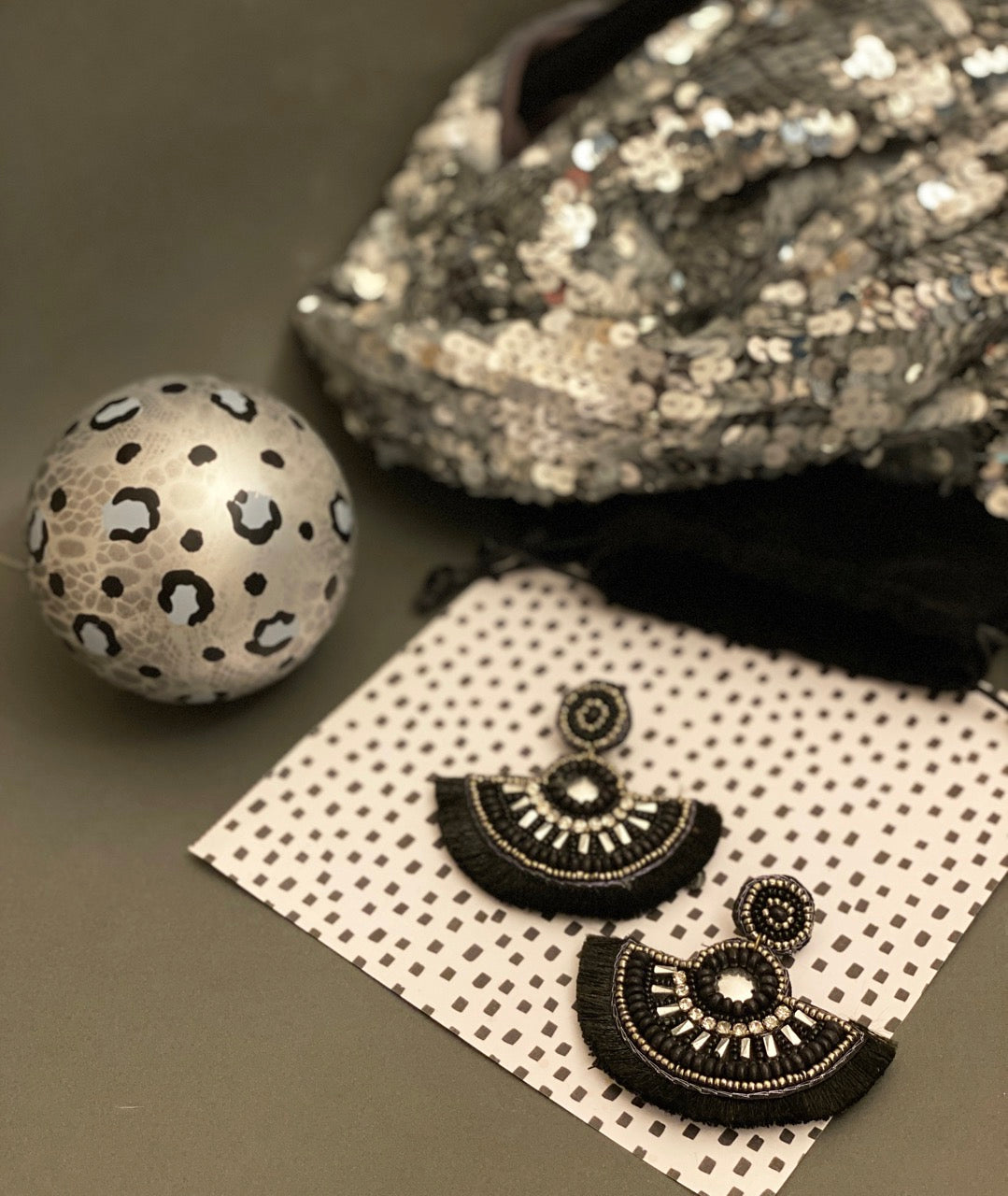 Bold Fan Club Onyx Earrings featuring a unique fan shape and playful "Feelings" patch, ideal for making a statement.