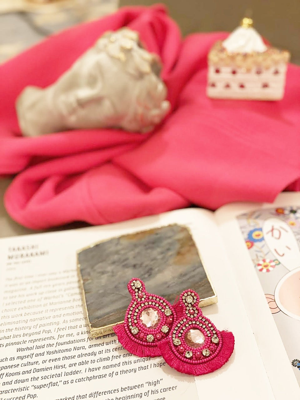 Space Oddity Pink Earrings with vibrant beadwork and a unique "Keep Your Hands Off" patch, ideal for parties.