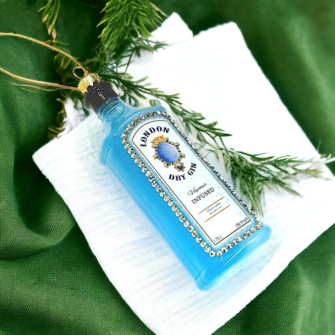 "Gin Bottle" ornament, featuring glittering details and a whimsical design, perfect for cheeky and unique holiday decor.