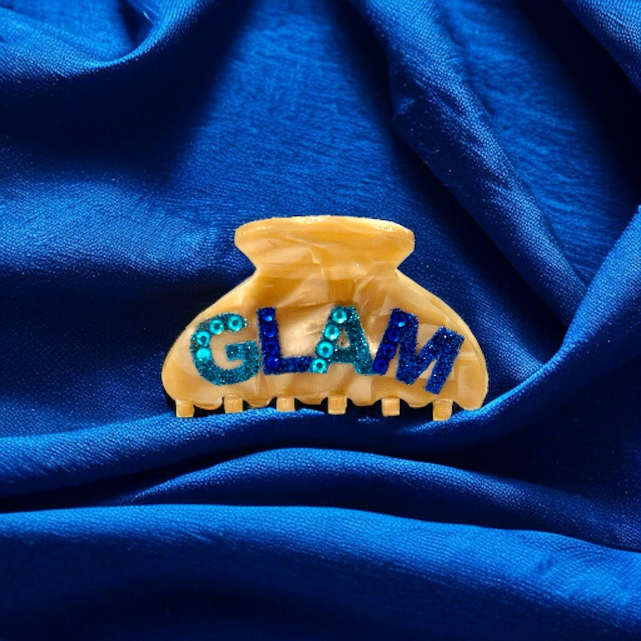 Hair clip adorned with shimmering crystals and delicate filigree, perfect for elevating any updo or half-up style. Keywords: hair clip, shimmering crystals, delicate filigree, updo, half-up style