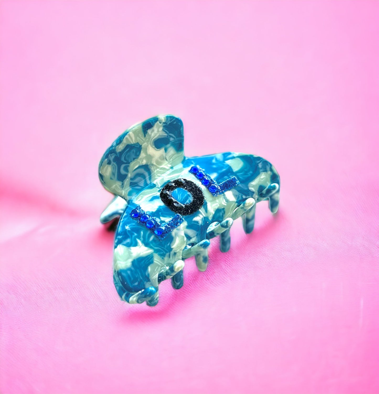 Rhinestone LOL hair clip in vibrant blue, a fun and stylish accessory for any look.