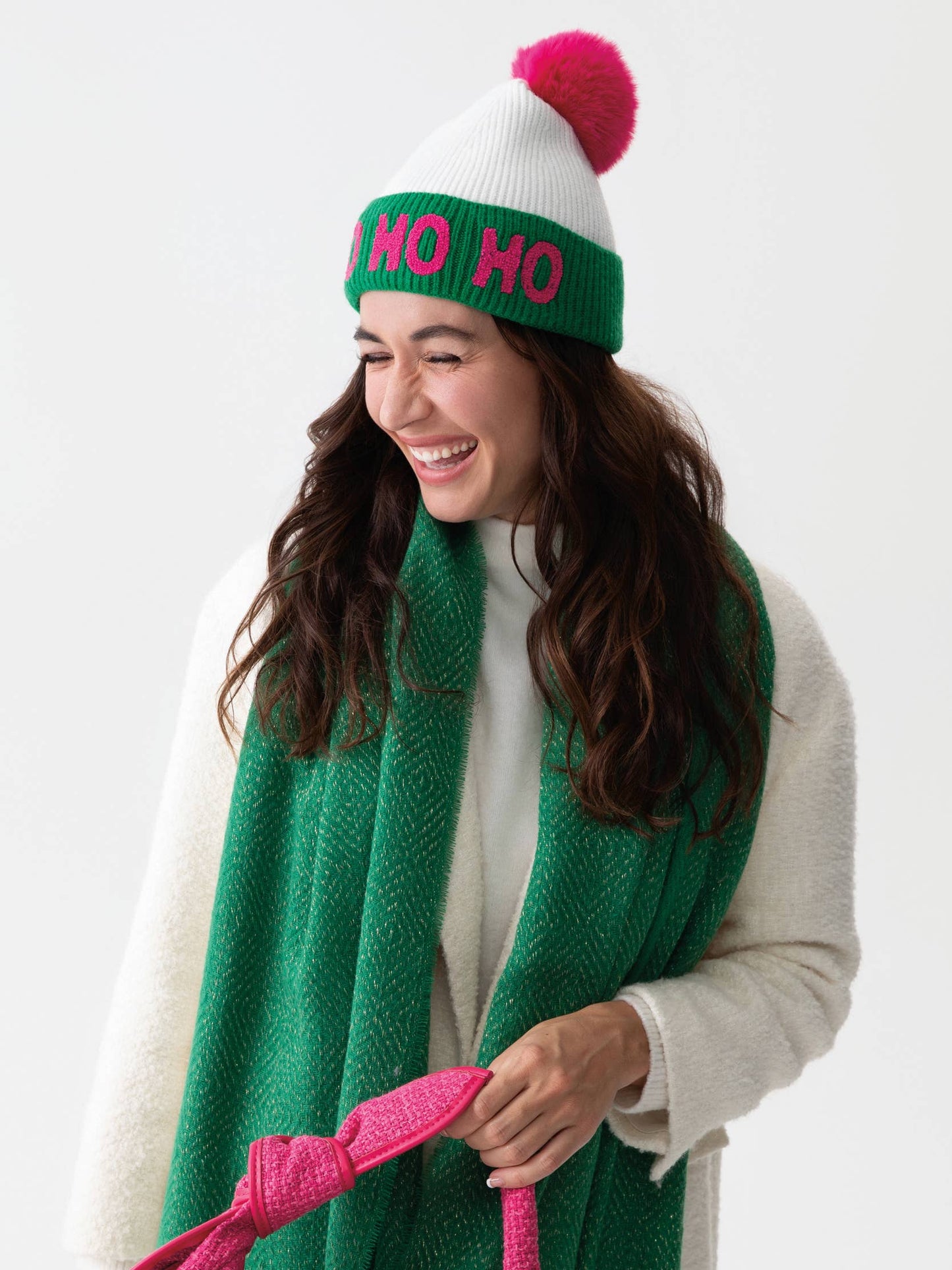 White winter hat featuring "HO HO HO" text.