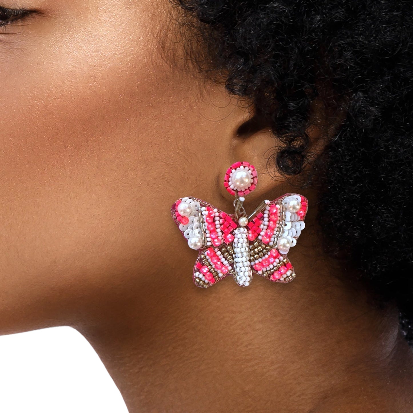 Add a splash of color to your wardrobe with our eye-catching fuchsia butterfly earrings, perfect for festivals, parties, or everyday wear.