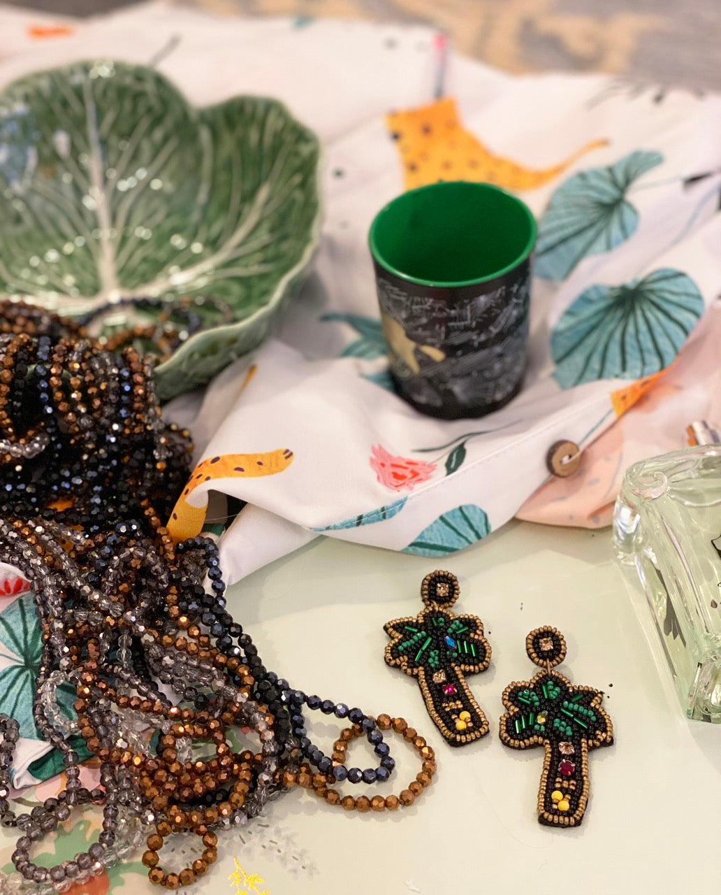 Shimmering Swarovski Palm Tree earrings with a unique "Hi / Bye" design, perfect for summer and resort styling.