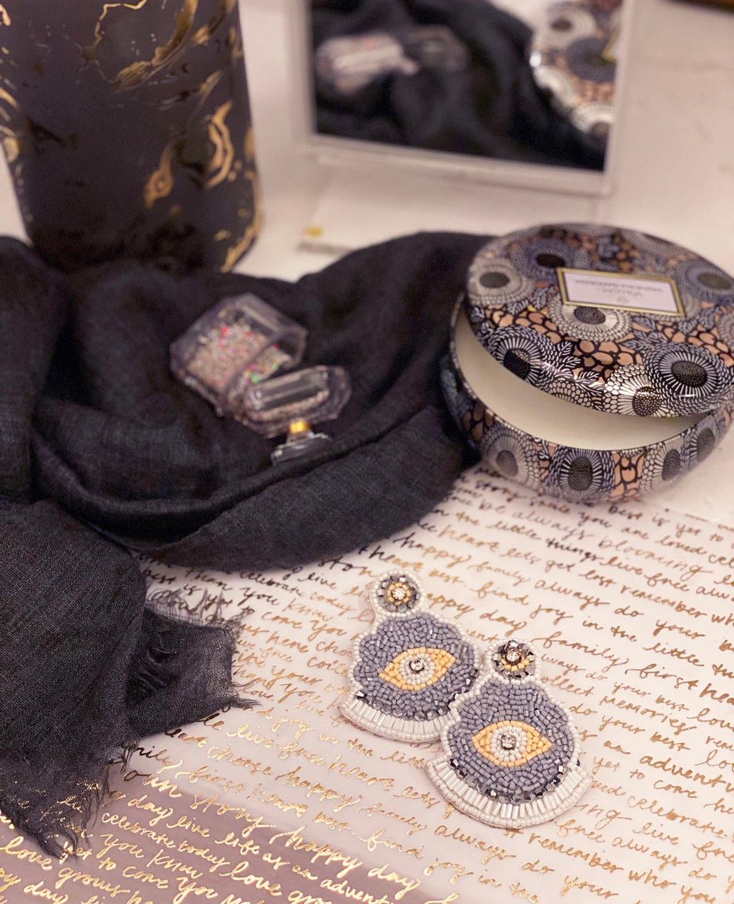 Artistic white and gray earrings with bold geometric shapes, handcrafted with a stars and stripes patch design.