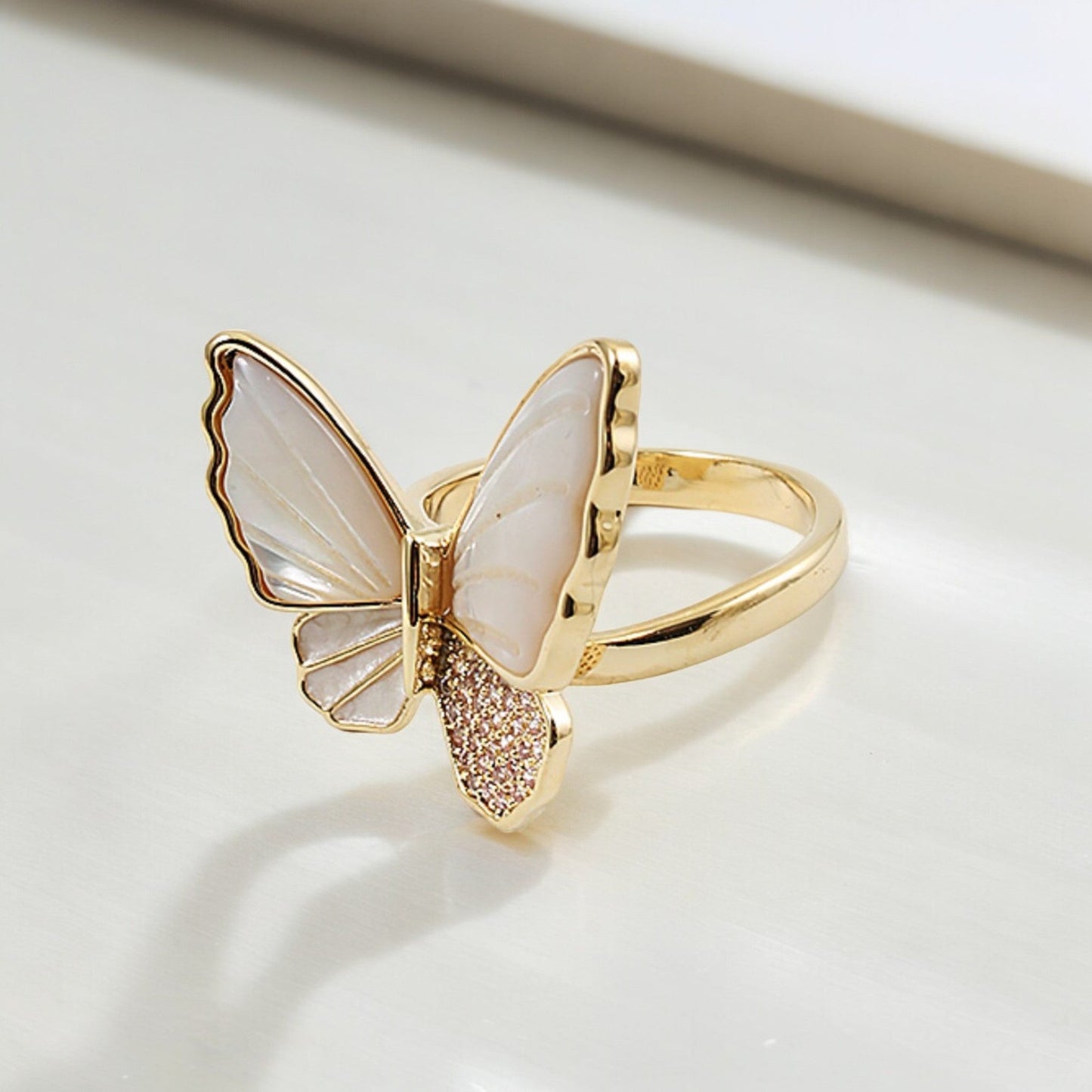 Delicate sterling silver butterfly ring with a timeless design. A dainty accessory that will add a touch of elegance to any outfit.