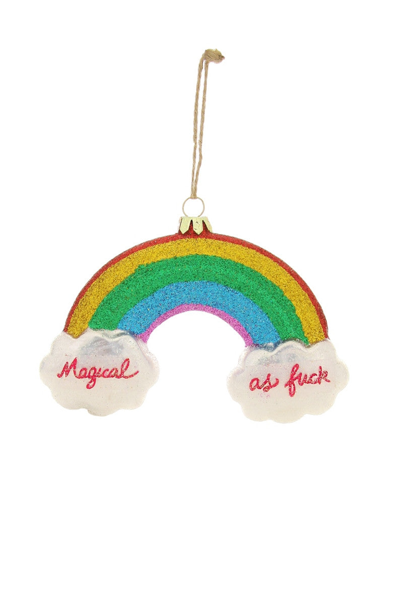 Bright and colorful rainbow ornament with glitter accents and "Magical as f***" text on clouds, perfect for bringing a fun twist to holiday decorations.