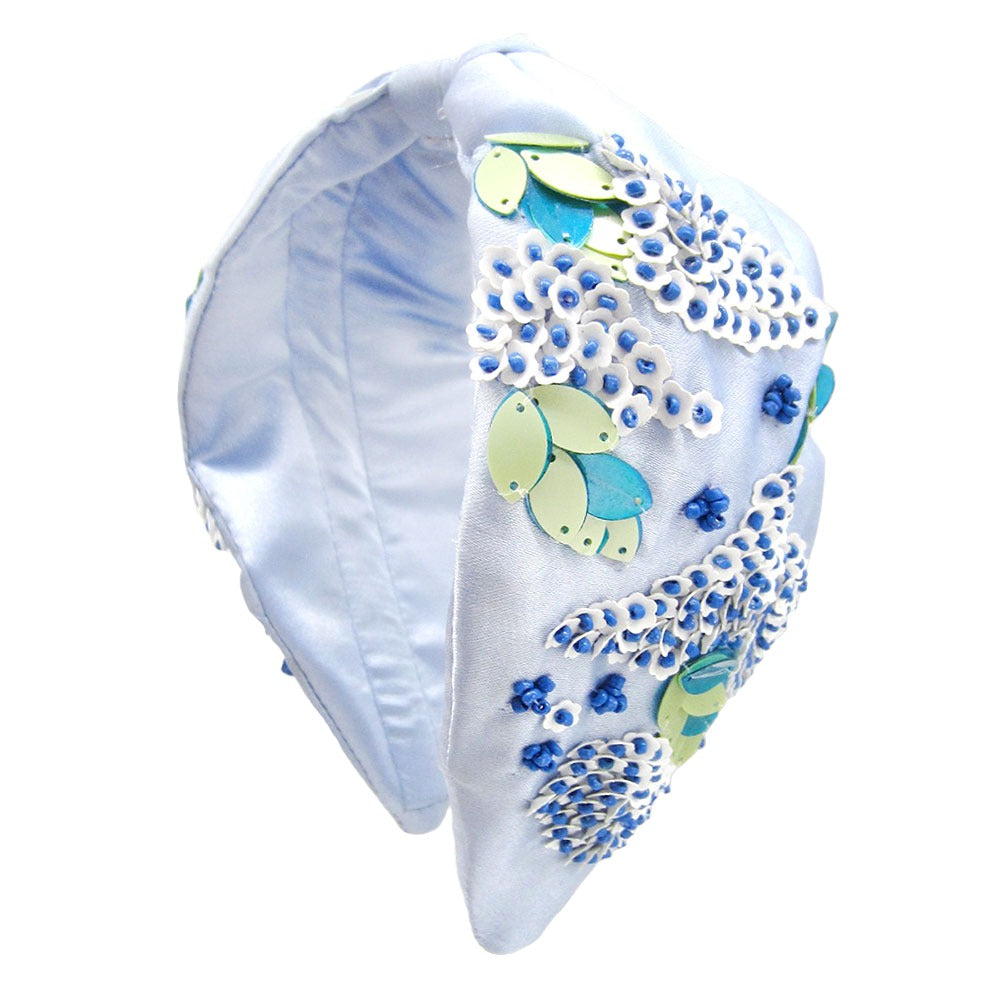 Handcrafted ocean-themed headband featuring vibrant colors and subtle sparkle.