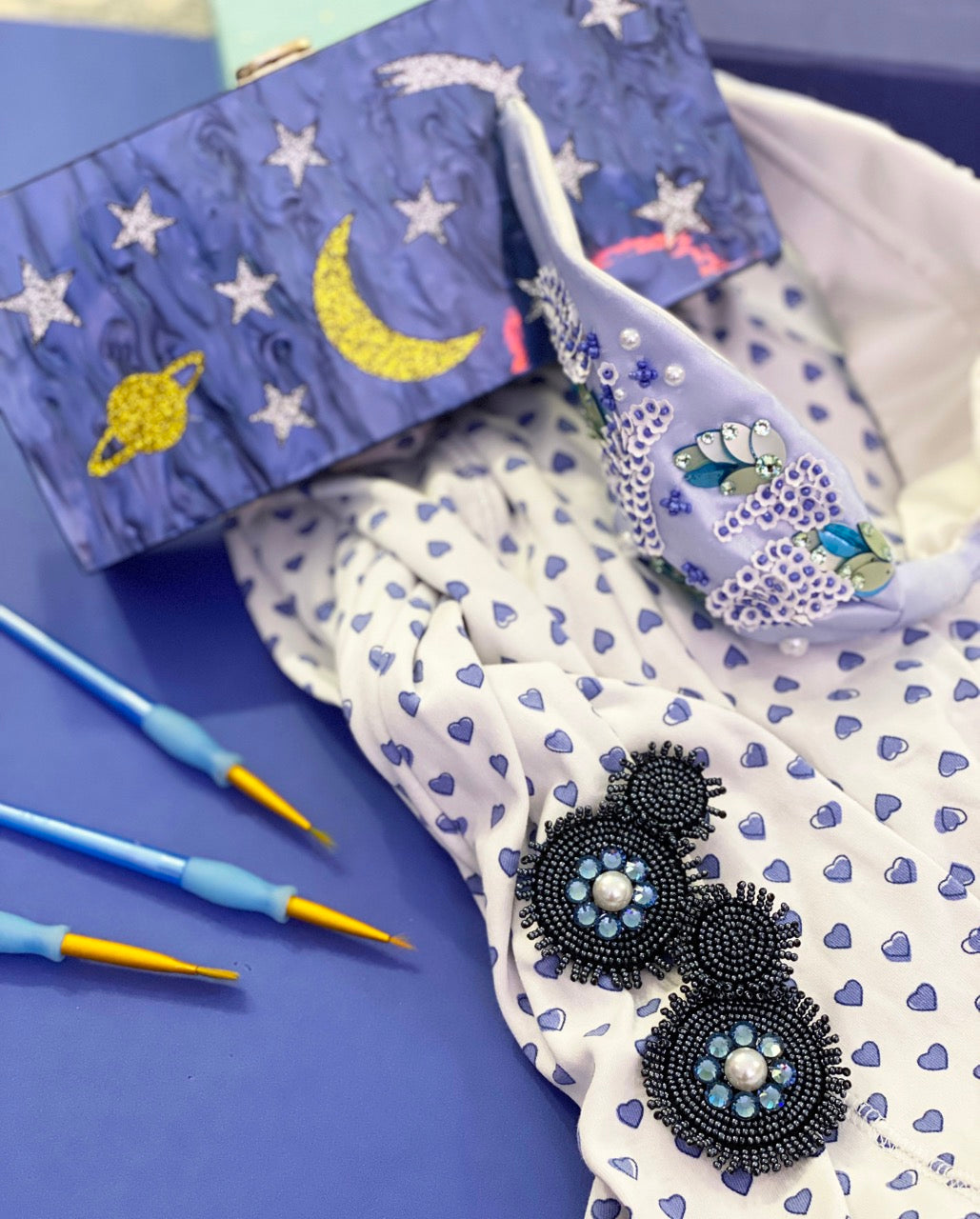 Midnight Magic earrings with elegant navy beading and stylish fringe, versatile for casual, chic, and bohemian outfits.