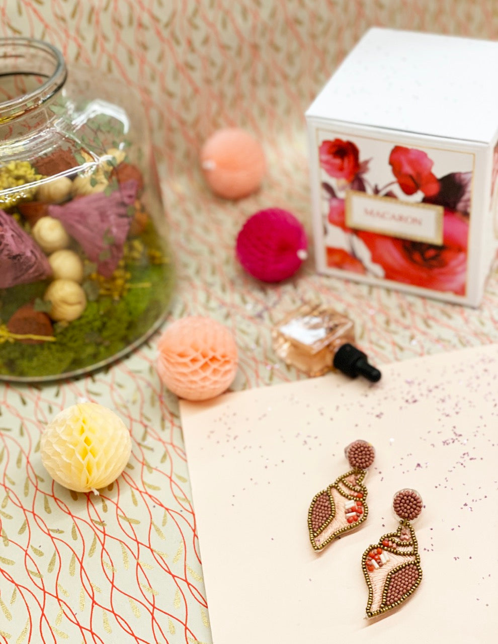 Coral and shell drop earrings with intricate beading, handmade for a unique and fashionable look.