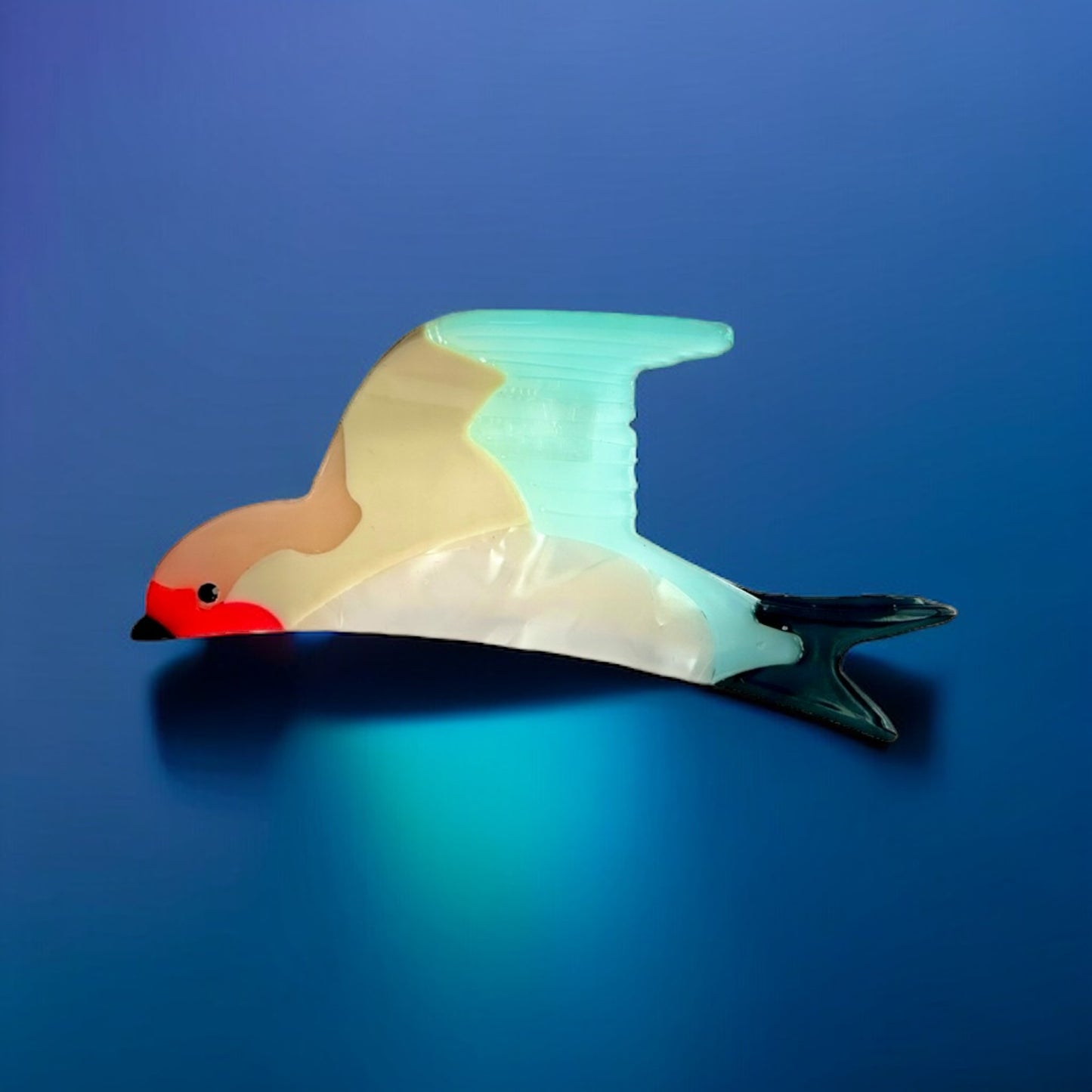 Hair clip featuring an American flag and eagle motif, celebrating American pride and making a statement of unity.