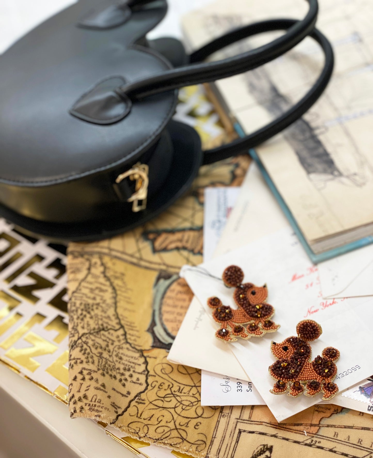 Fun and quirky poodle earrings with intricate beading and unique "OMG!!" detail, perfect for making a statement.