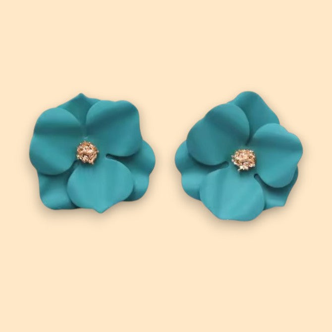 Teal floral earrings with a gold center