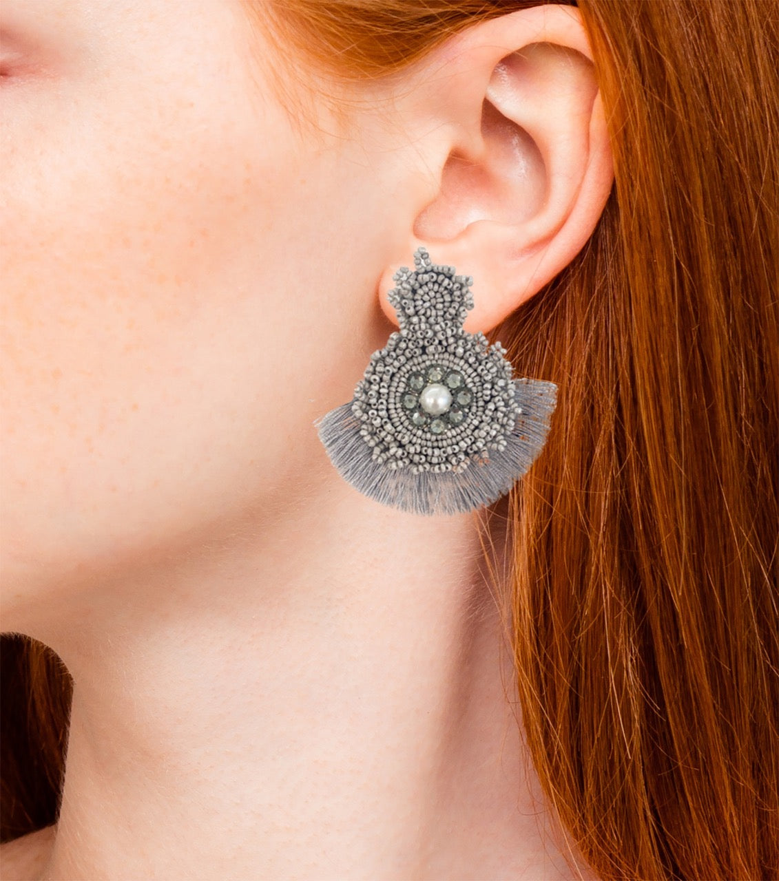 Grey fringe statement earrings with intricate beading and a playful design, handcrafted and lightweight.