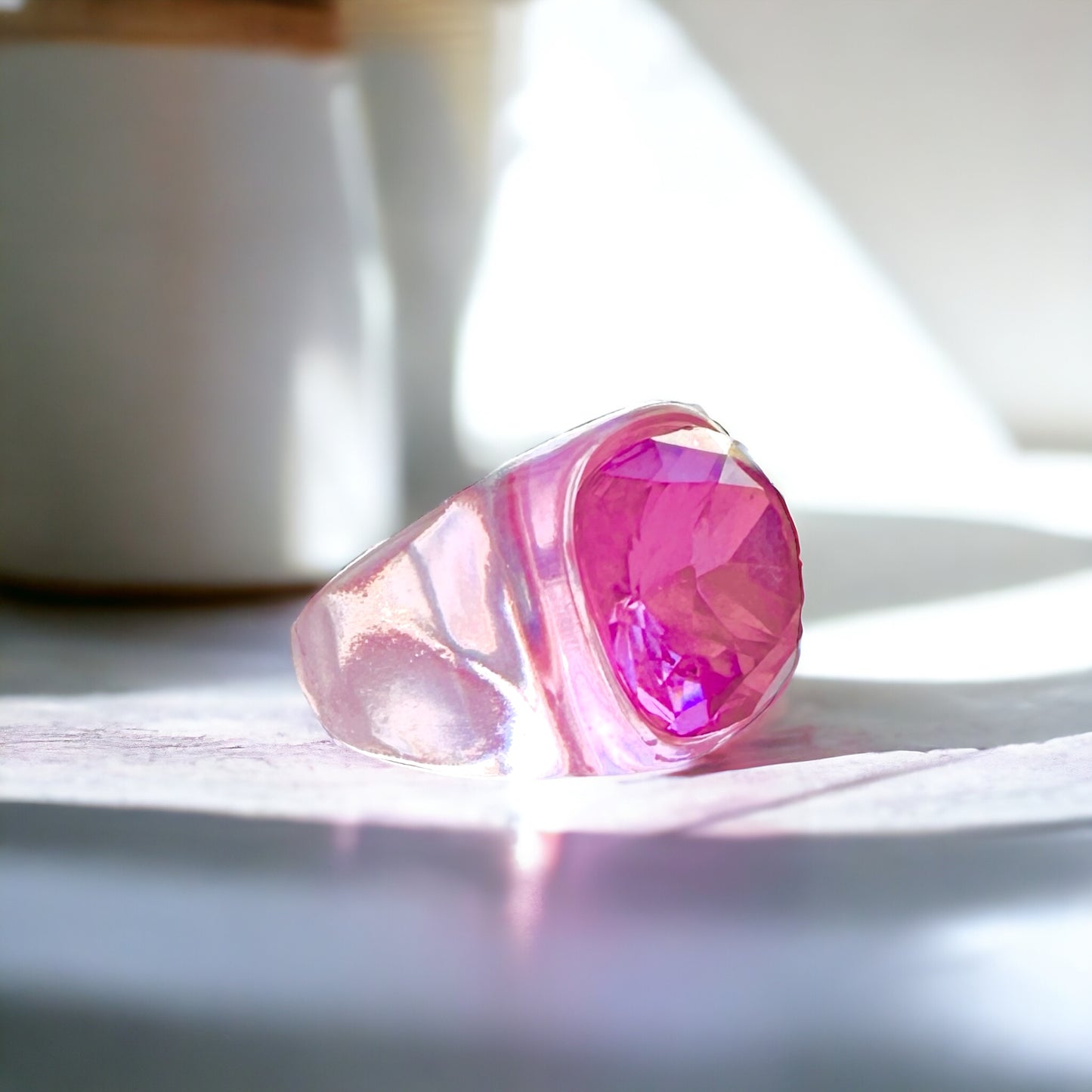 Radiant rose quartz ring with a captivating oval-cut stone, showcasing the gemstone's natural beauty and clarity.