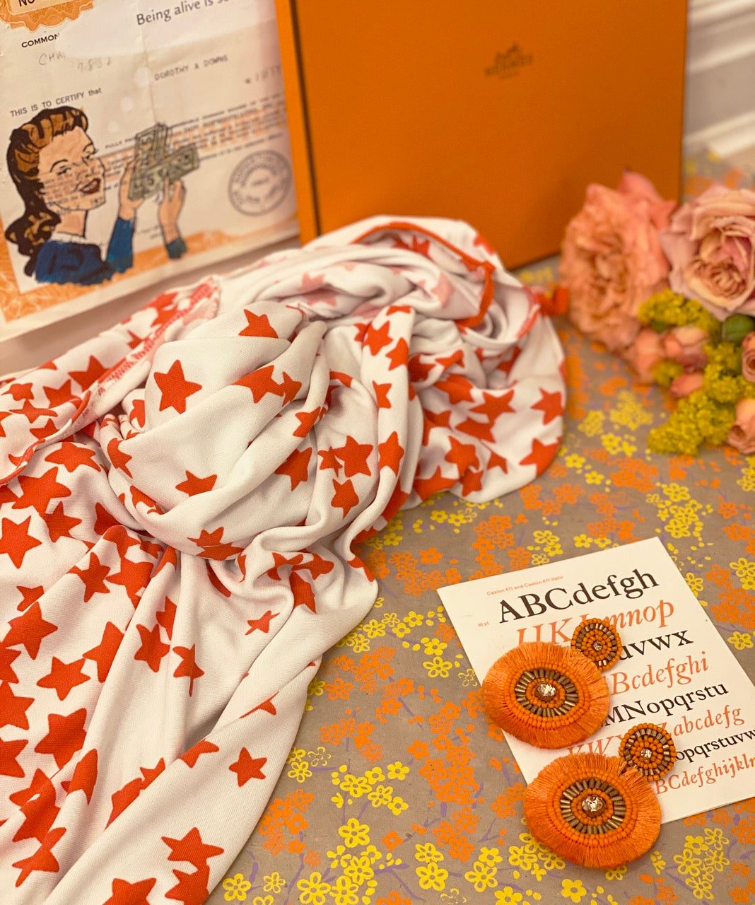 Minimalist bright orange earrings, perfect for adding a playful pop of color to your outfit.