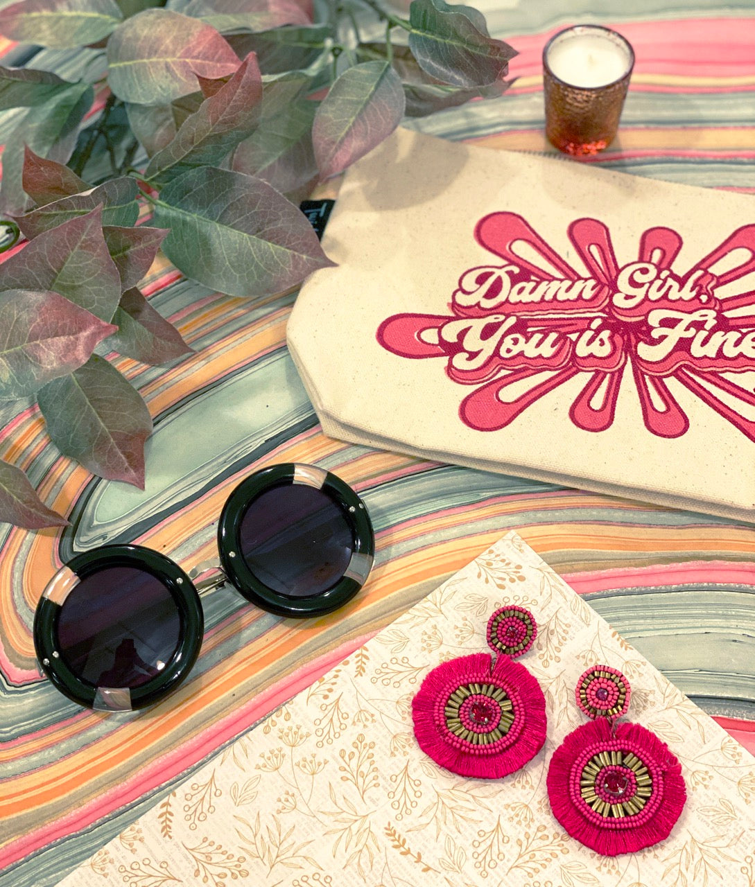 Handcrafted pink statement earrings with fun kiss emoji and playful patches.