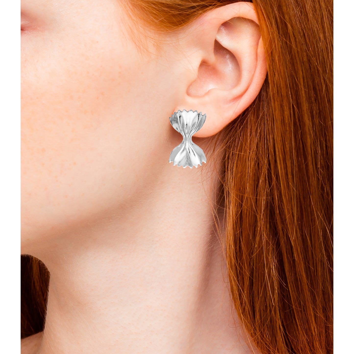 Bowtie pasta-inspired earrings available in gold and silver, perfect for adding a quirky touch to any outfit.