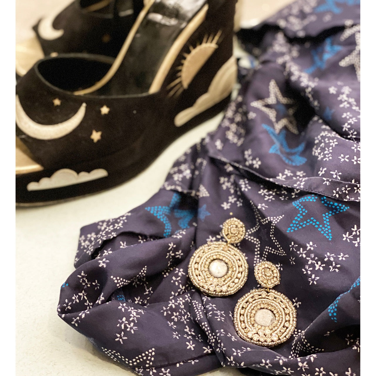 Sparkle Shield Earrings with silver beading and shimmering rhinestones, offering a timeless and elegant accessory.