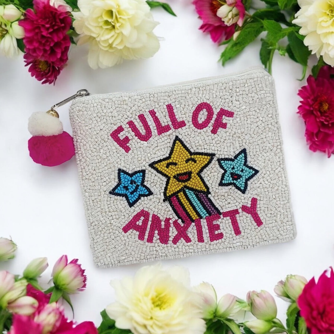 White zippered pouch with fun graphics and zipper.