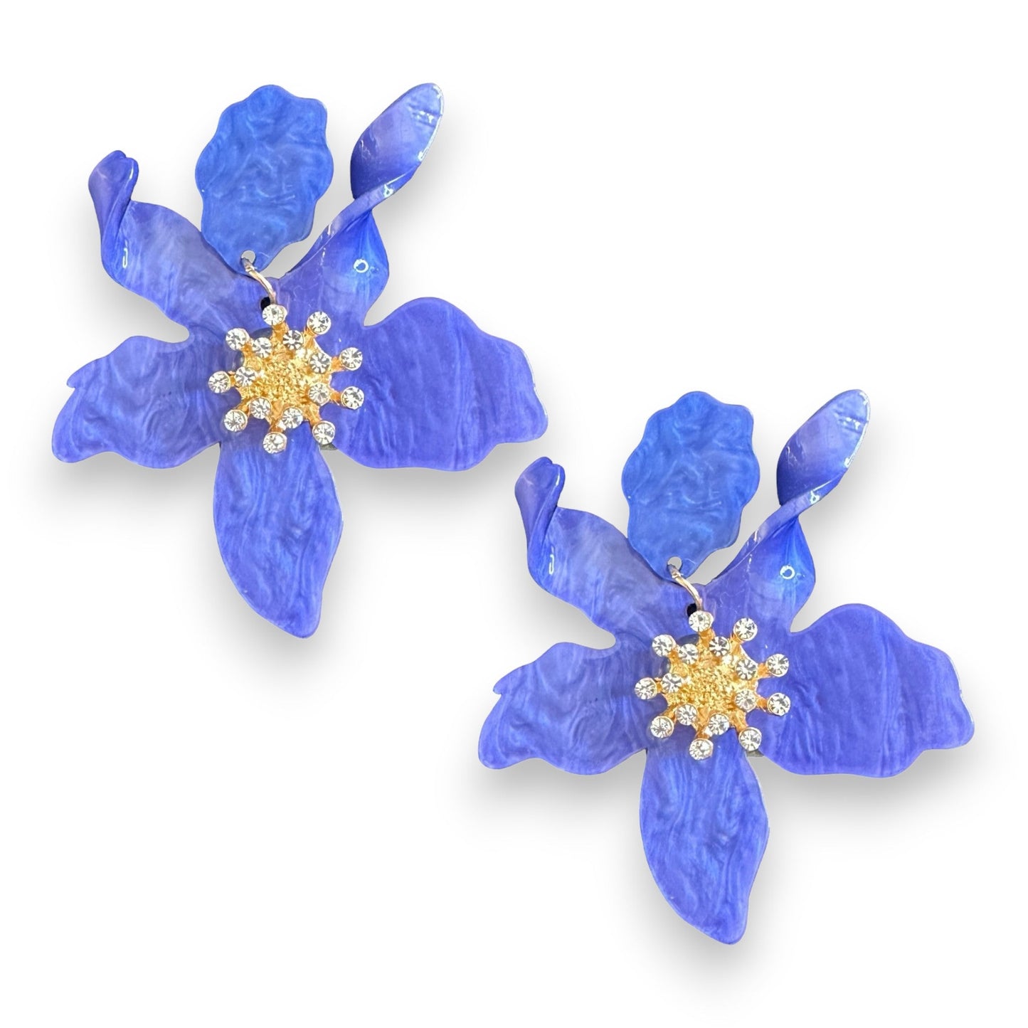 Blue flower-shaped earrings with sparkling cubic zirconia accents, perfect for adding a touch of glamour to any outfit.