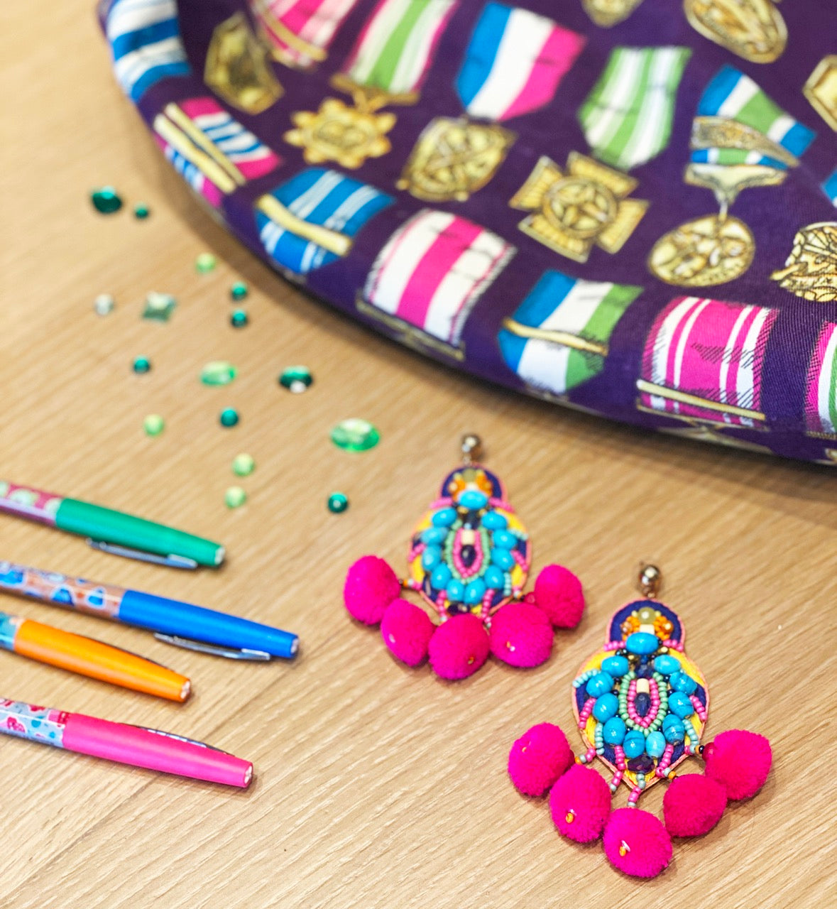 Oversized tropical punch earrings with embroidered design and colorful mixed media embellishments