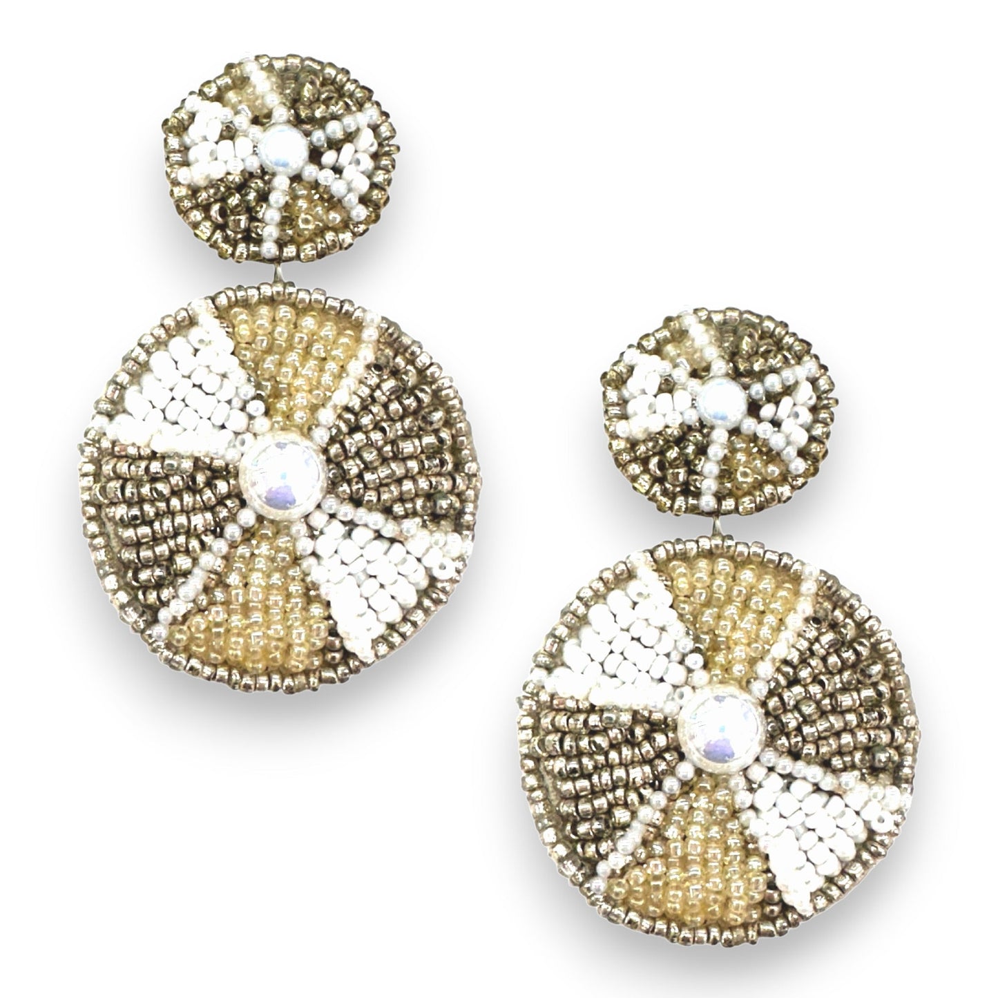 Vibrant pinwheel earrings, meticulously handcrafted from polymer clay, showcase exquisite craftsmanship and attention to detail. Their colorful pinwheel design makes them a captivating accessory, enhancing any ensemble with a touch of playful elegance.